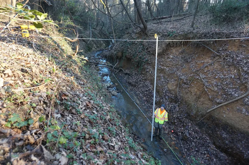 Actaeon crew scoping a residential property in Maryland — every drainage and landscaping plan starts from what is actually on the site